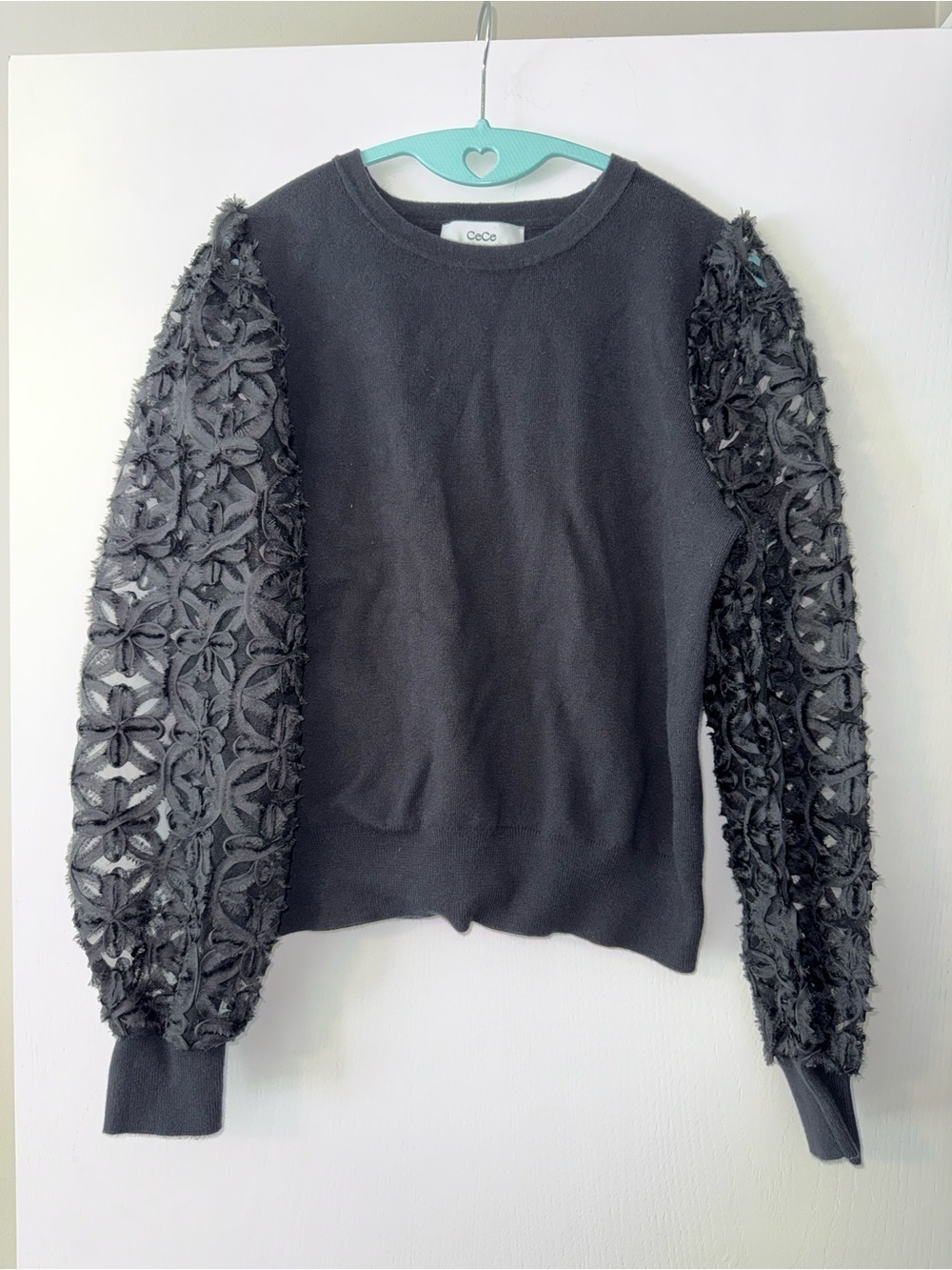 CeCe sweater with floral puff sleeves